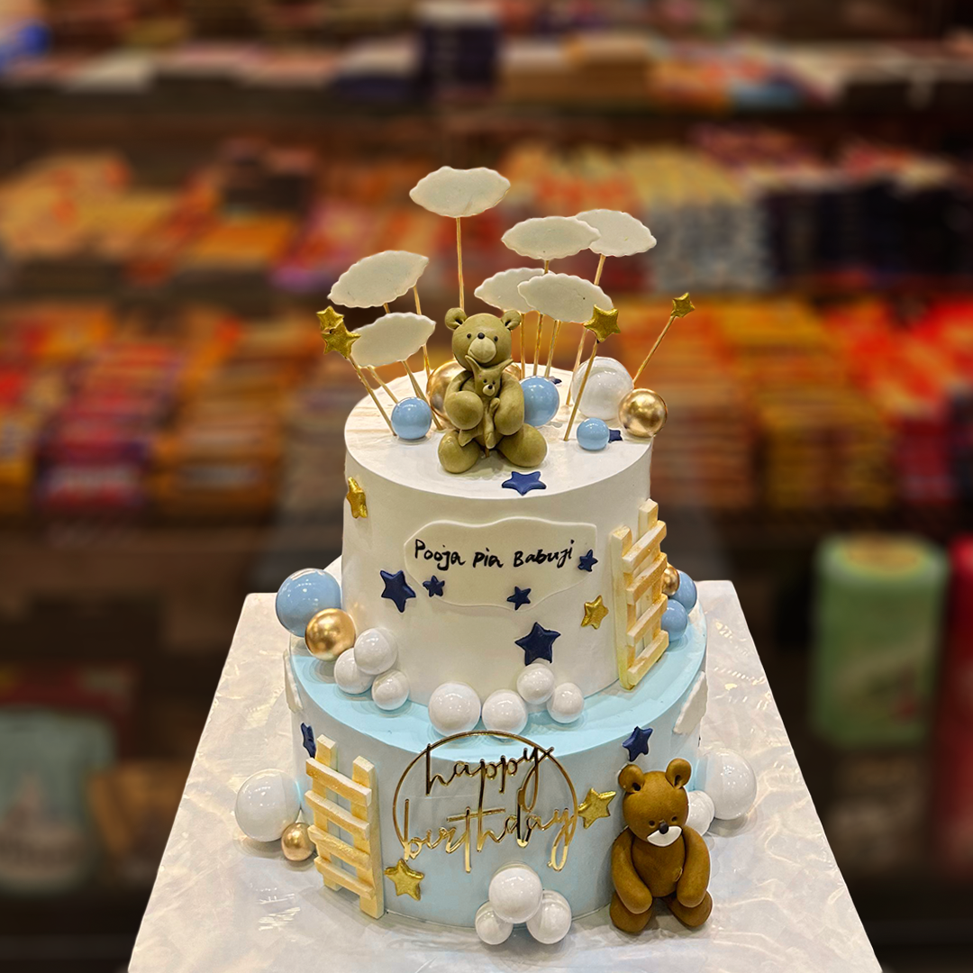 Two Tier Clouds and Star Cake